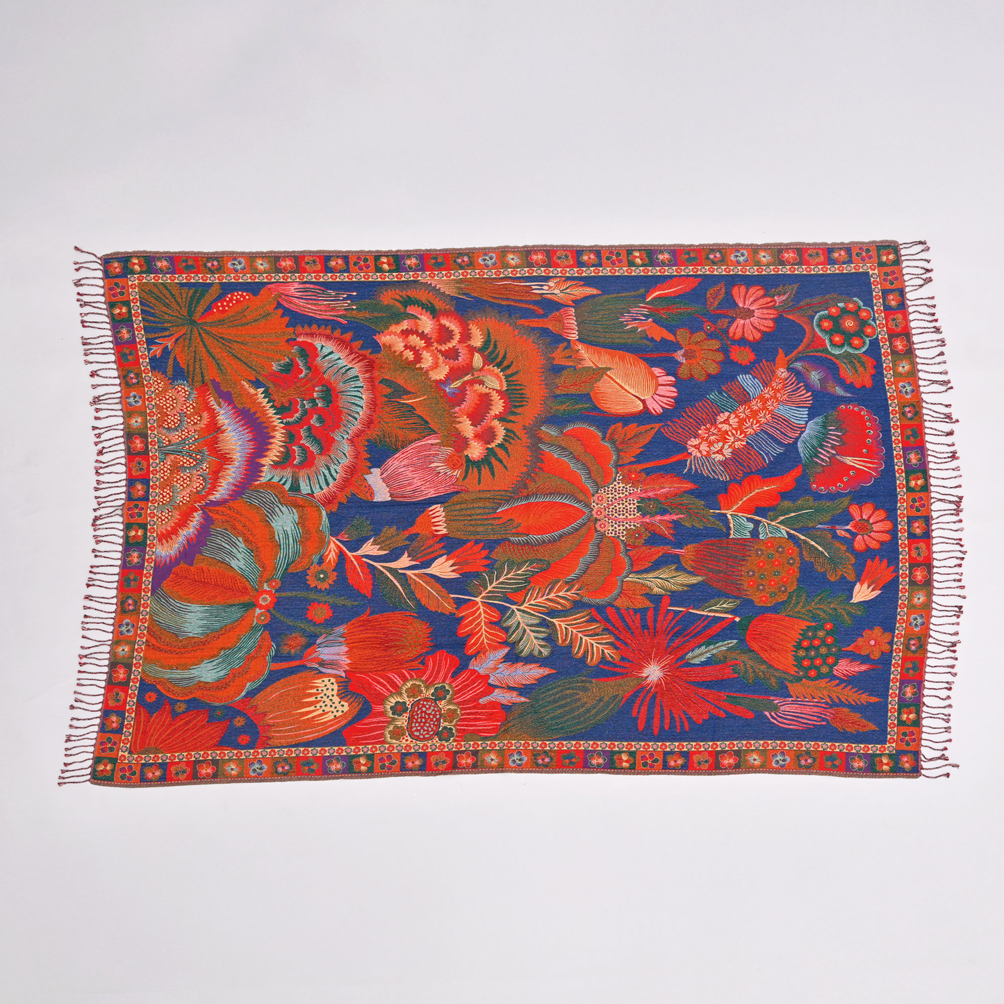 Brighten your space with our Canvas Of Fire Throw! | Elevate your living room style effortlessly. | Cozy up with our vibrant throws this season.