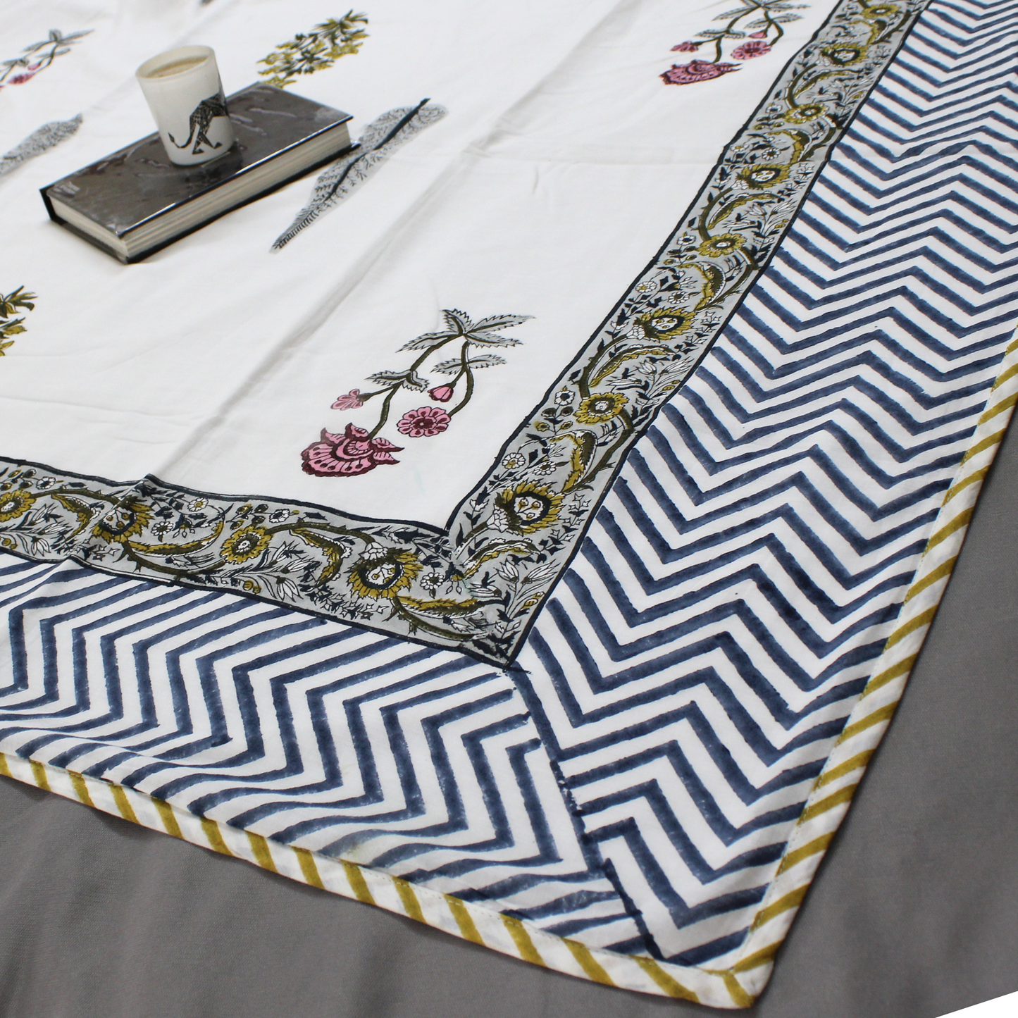 Shop at earthandoaks.com for premium cotton muslin white color dohars blankets, hand block printing of Flowers and Geometrical shape inspired from nature and heritage motifs, lightweight and incredibly soft. Bring heritage back to your home. Dimensions: Single 65"x 95", Machine wash on gentle cycle with mild detergent, tumble dry low.