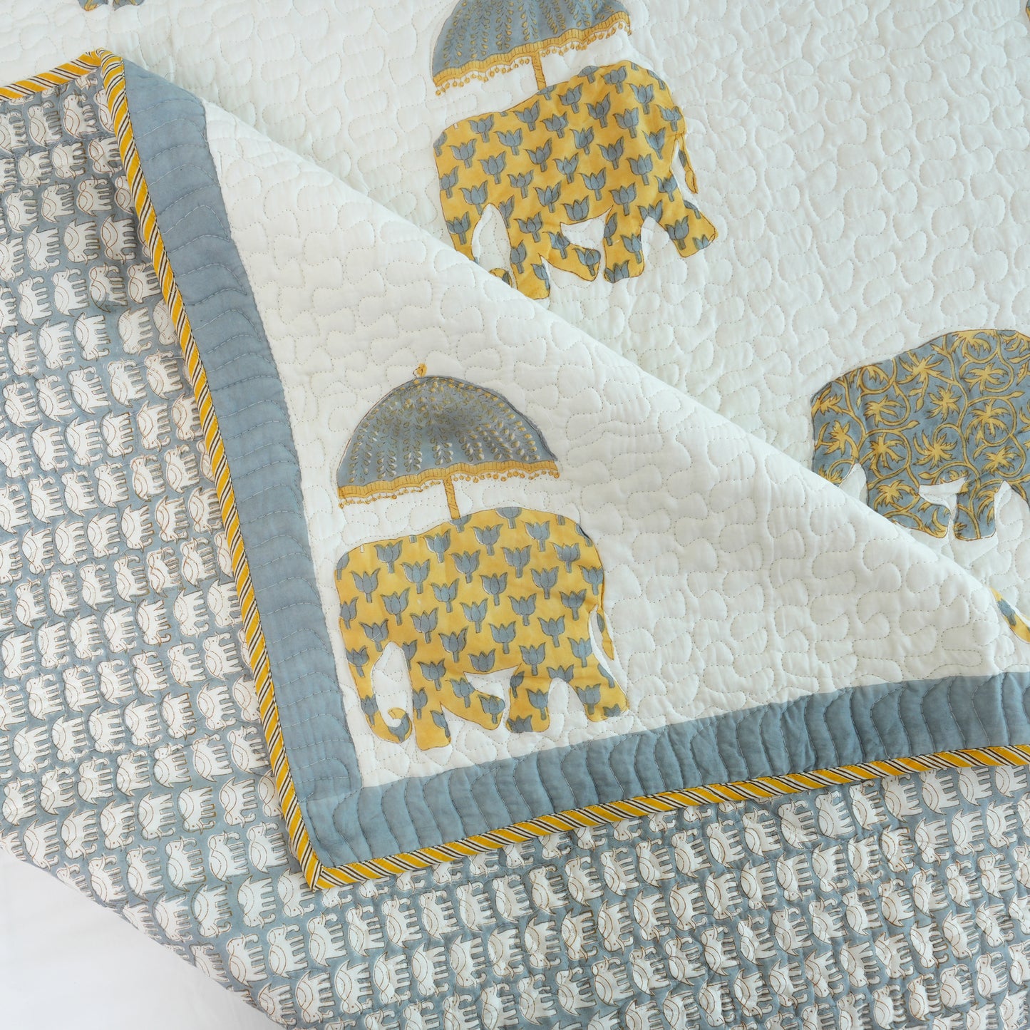 Kainaat - Handblock Quilted Bedcover