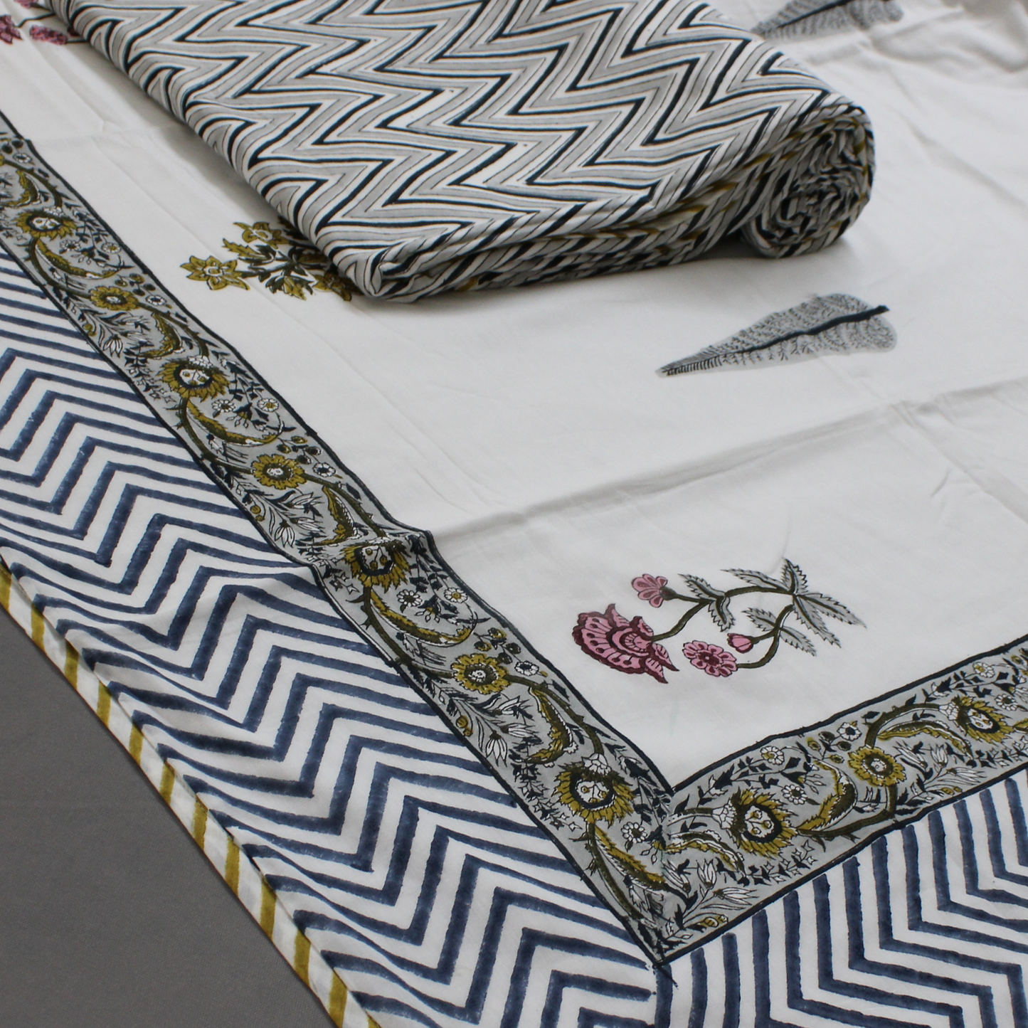 Shop at earthandoaks.com for premium cotton muslin white color dohars blankets, hand block printing of Flowers and Geometrical shape inspired from nature and heritage motifs, lightweight and incredibly soft. Bring heritage back to your home. Dimensions: Single 65"x 95", Machine wash on gentle cycle with mild detergent, tumble dry low.