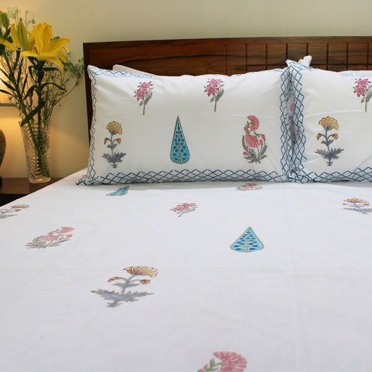 100% Cotton, handblock-printed, vibrant garden-inspired prints, exceptional softness, serene comfort
