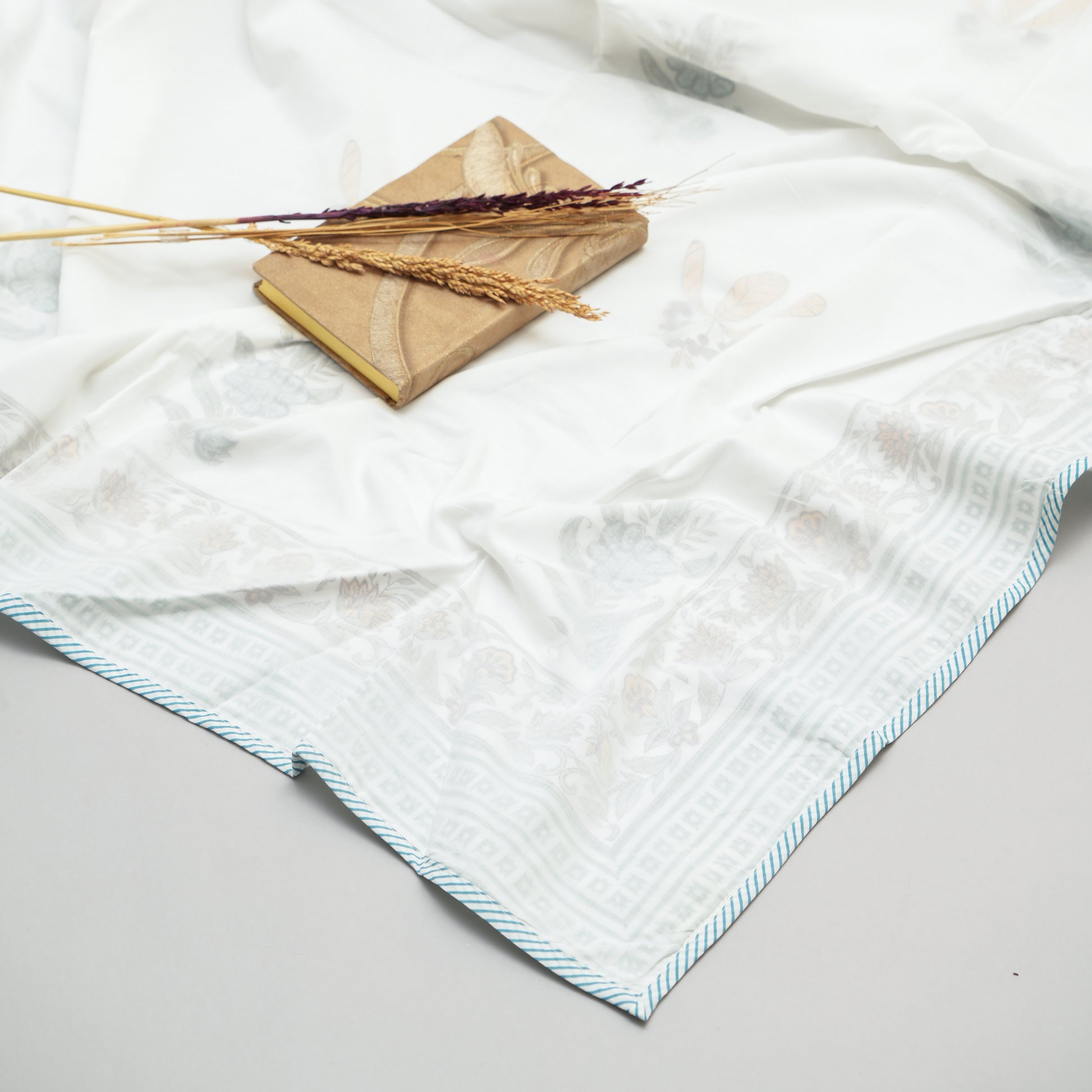 100% Cotton Muslin, Hand Block Printed, Lightweight & Breathable, Three Layers of Softness, Artisanal Craftsmanship.