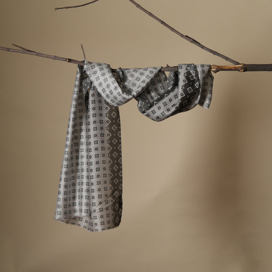 Silk stole crafted with a luxurious blend of 80% modal and 20% silk. Experience unparalleled softness, graceful drape, and subtle sheen. Limited stock - secure yours today. Explore the collection.